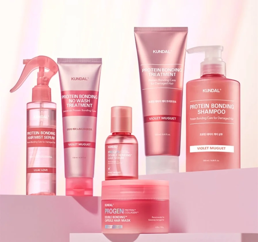 ピンク色のパッケージが特徴的なKUNDAL（クンダル）のプロテインボンディングヘアケア製品ラインナップ。