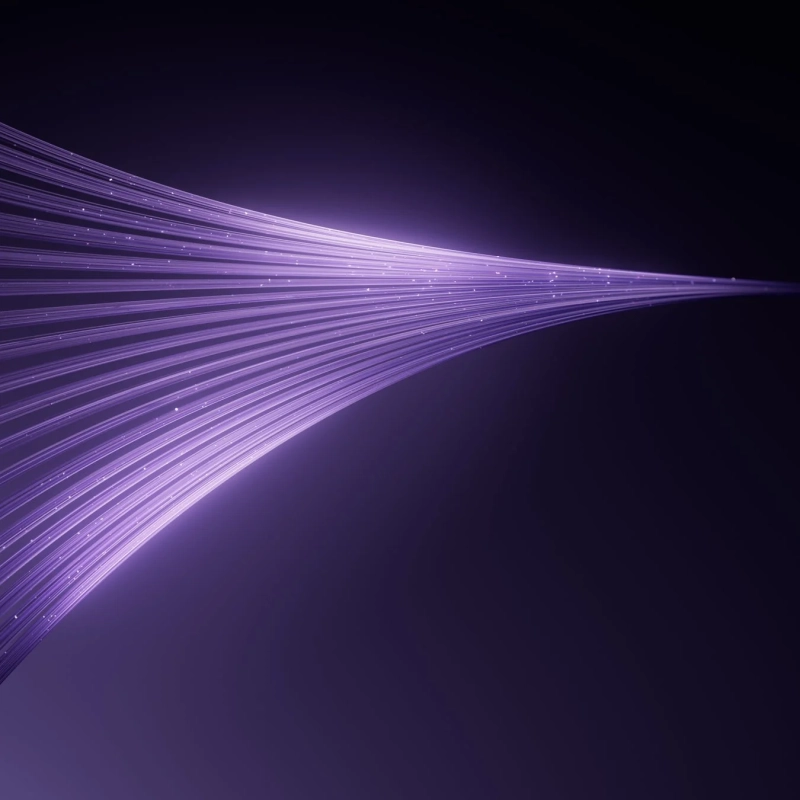 左から右へ曲線を描いて流れるような鮮やかな紫色の光の線