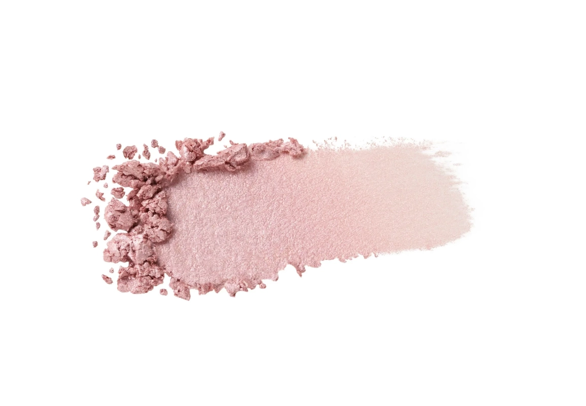 ピンク色のきらめく化粧品パウダーのスウォッチ